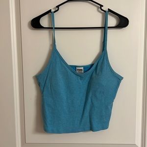 Crop tank with bra lining and pads.
